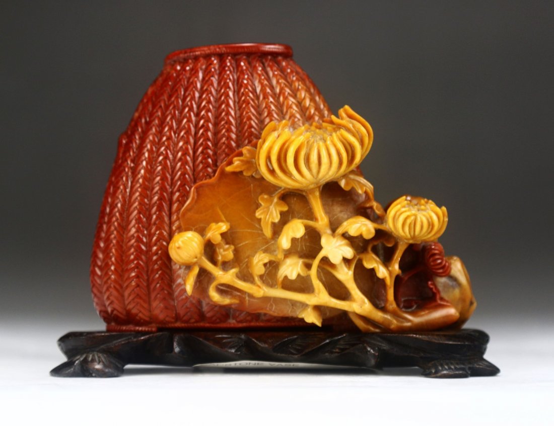 A Soapstone Carved Basket & Flower Group: A Soapstone Carved Basket & Flower Group: presented on a wood stand; Size: L: 4-1/2"