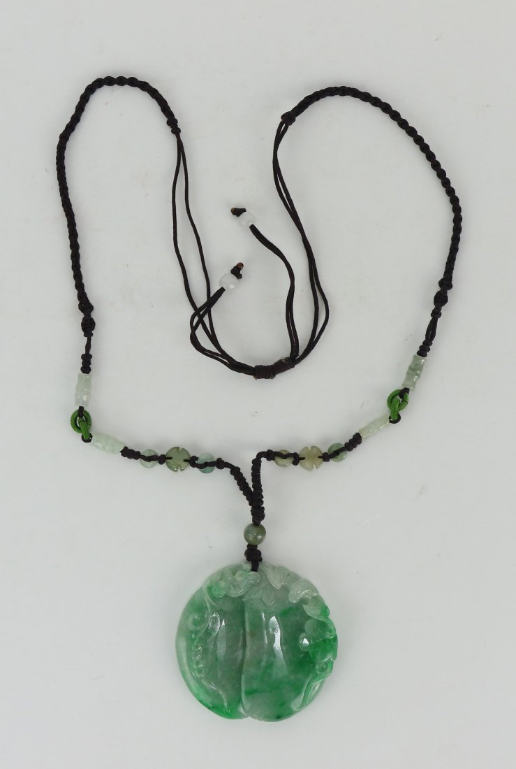 A Chinese Jadeite Carved Pendant Necklace (1 of 3)