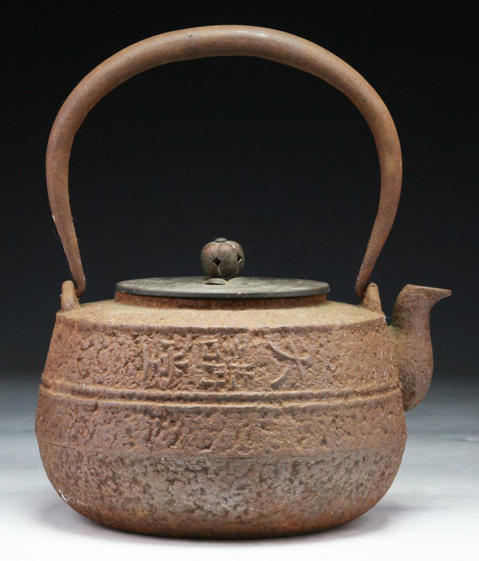 A Japanese Antique Iron Teapot: A Japanese Antique Iron Teapot; Size: L: 7-1/4"