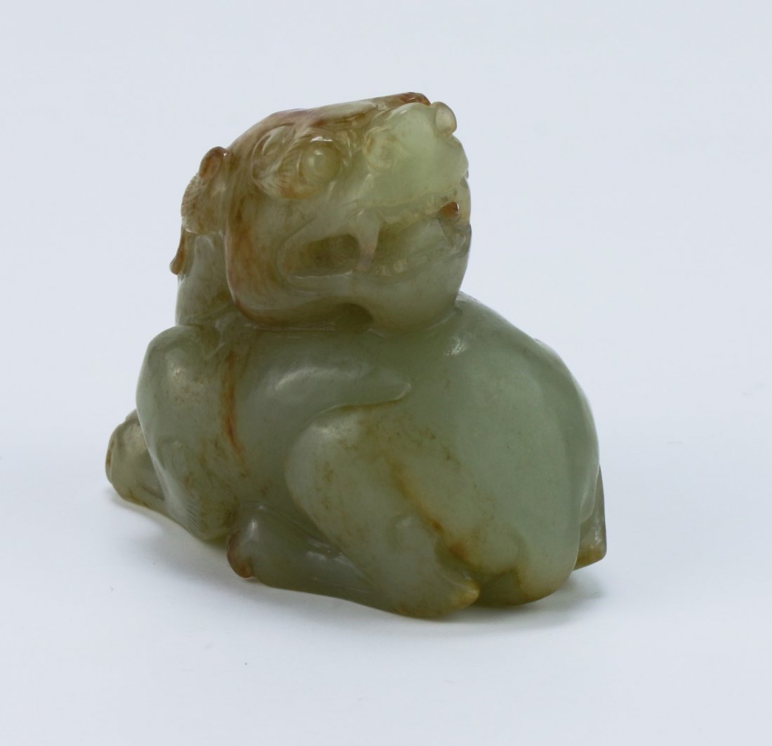 A Nephrite Celadon Jade Carved Lion Dog (1 of 4)