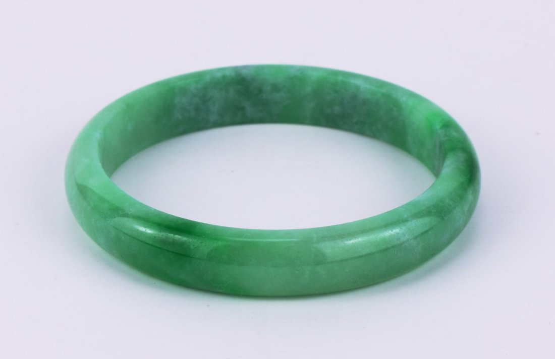 A Translucent Green Jadeite Bangle With AIGL (1 of 3)