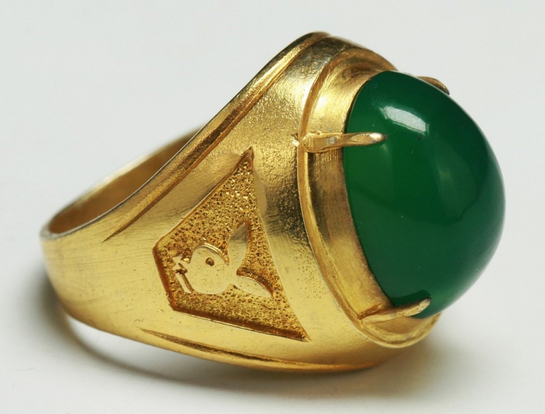 A Highly Translucent Green Jade Or Jadeite Ring (1 of 3)
