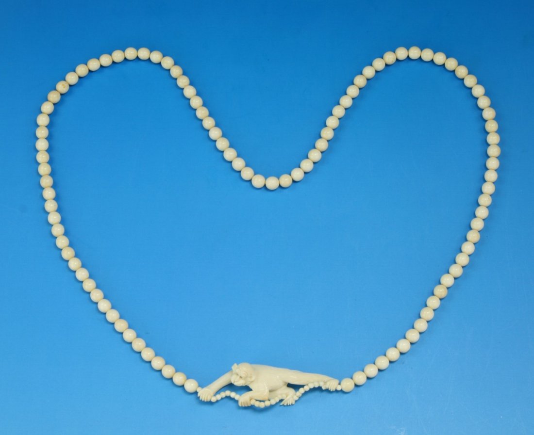 A Chinese Antique Ivory Carved Pendant Necklace (1 of 3)