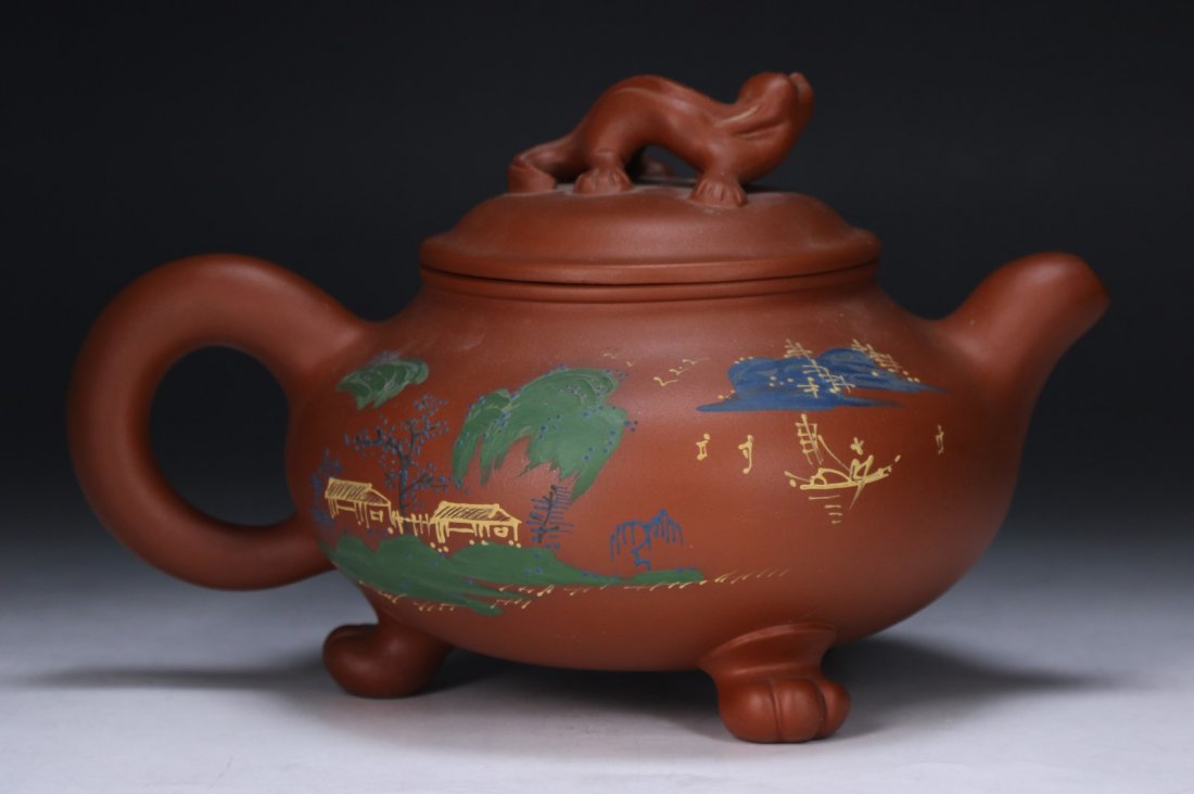 A Chinese Yixing Zisha Teapot: A Chinese Yixing Zisha Teapot; Size: L: 10"