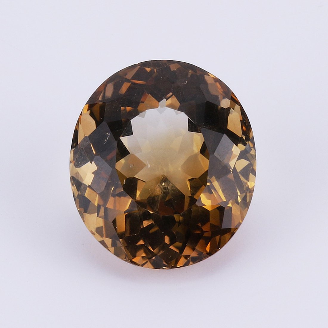 An Oval Brilliant Cut Orange Brown Topaz Cabochon With (1 of 3)