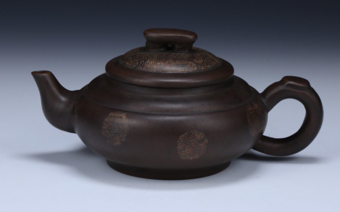 A Chinese Yixing Zisha Teapot With Cover: A Chinese Yixing Zisha Teapot With Cover; Size: L: 7-1/4"