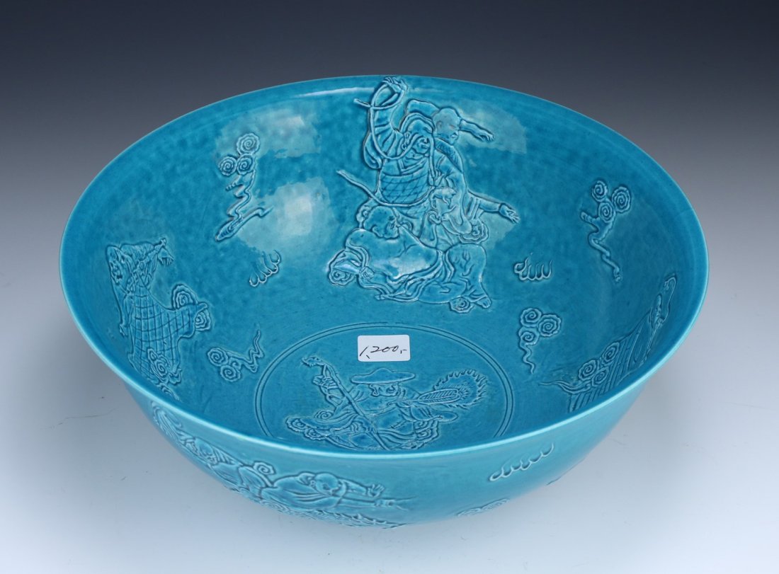 A Chinese Antique Blue Glazed Porcelain Bowl: A Chinese Antique Blue Glazed Porcelain Bowl: with celestial figures around the body, in a vibrant turquoise glaze, with a 'QIANLONG' mark on the base; Size: D: 10-1/4"