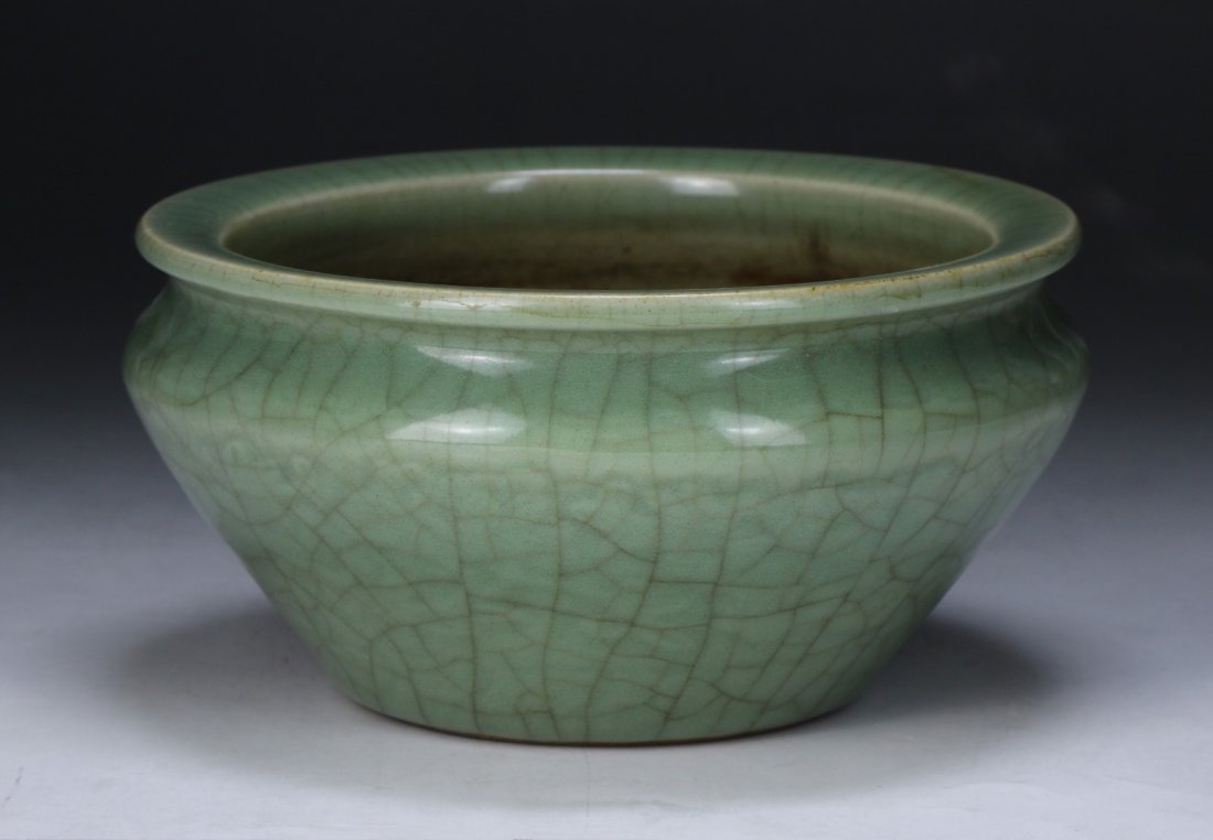 A Chinese Antique Celadon Glazed Porcelain Bowl: A Chinese Antique Celadon Glazed Porcelain Bowl; Size: D: 6-1/4"