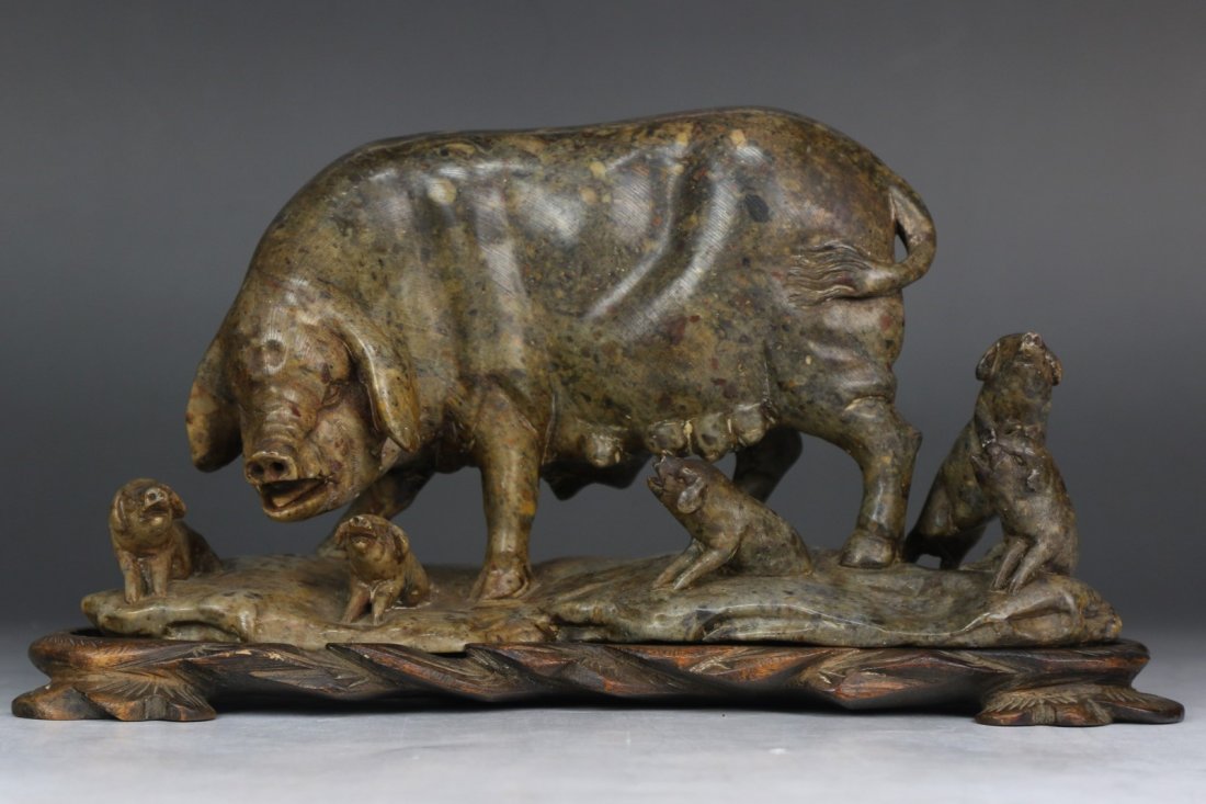 A Soapstone Carved Swine Group: A Soapstone Carved Swine Group; Size: L: 9"