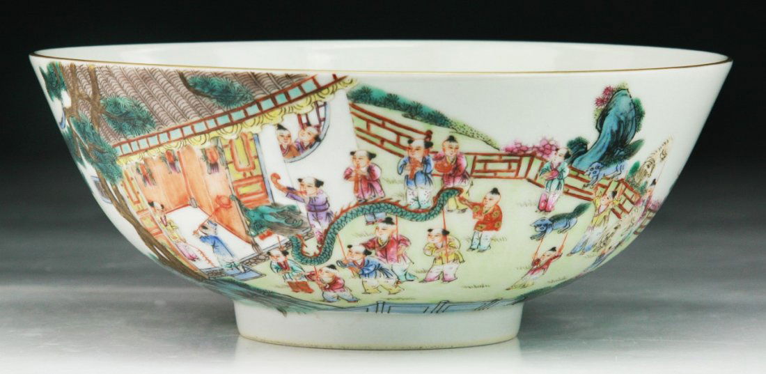 A Chinese Antique Famille Rose Porcelain Bowl: A Chinese Antique Famille Rose Porcelain Bowl: signed 'QIANLONG' in cobalt blue on the base; Size: D: 7"