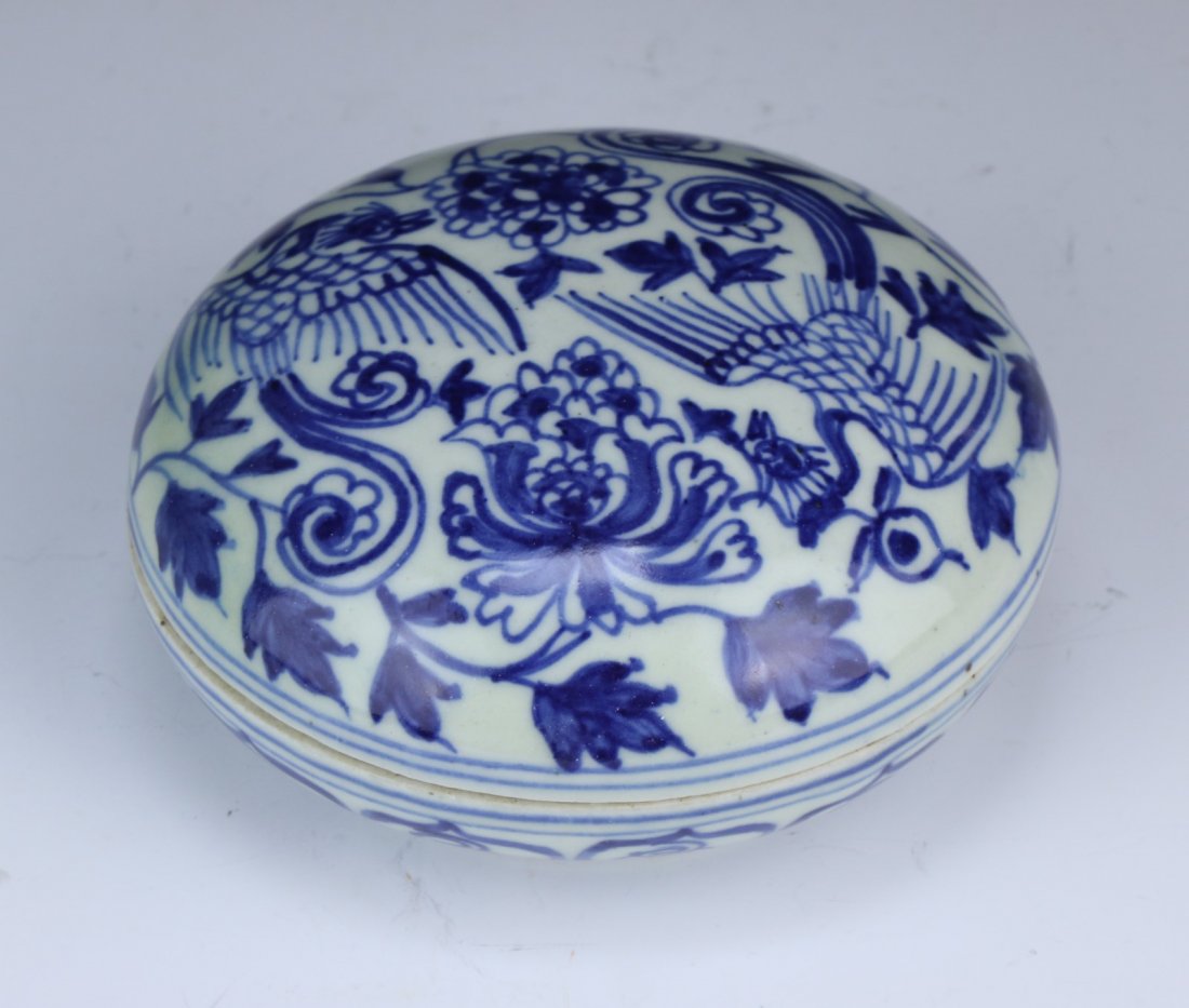 A Chinese Antique Blue & White Porcelain Lidded Case: A Chinese Antique Blue & White Porcelain Lidded Case: of circular form, the cover finely painted with phoenix in flight amid blossoming branches; Size: D: 4-1/4"