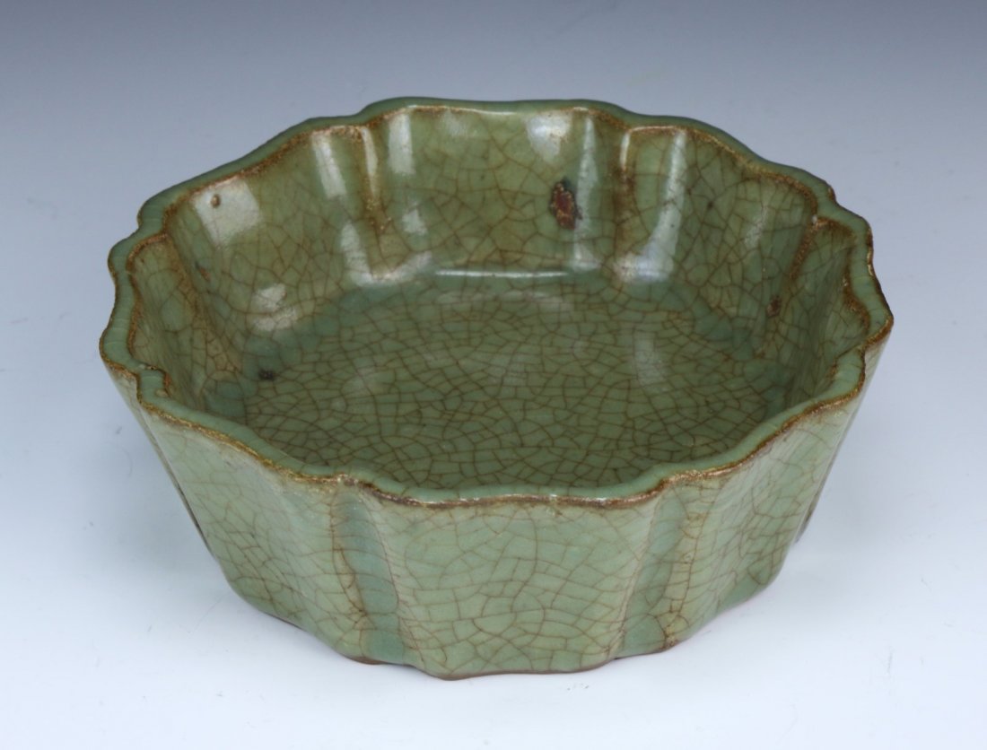 A Chinese Antique Celadon Glazed Porcelain Bowl: A Chinese Antique Celadon Glazed Porcelain Bowl; Size: D: 4-3/4"