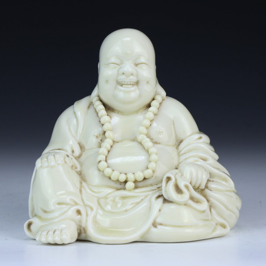 A Chinese Antique White Glazed Porcelain Buddha (1 of 3)