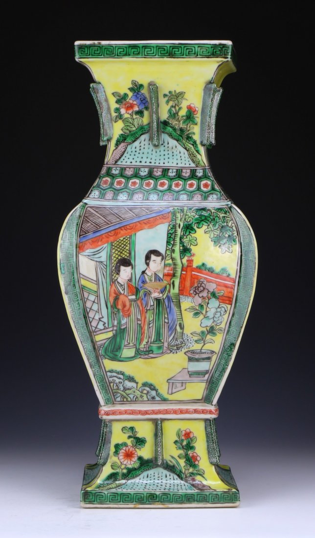 A Chinese Antique Famille Verte Porcelain Vase: A Chinese Antique Famille Verte Porcelain Vase: of square form, the exterior finely painted with figures amid a garden, missing handles, of QING Dynasty; Size: H: 15-1/4"