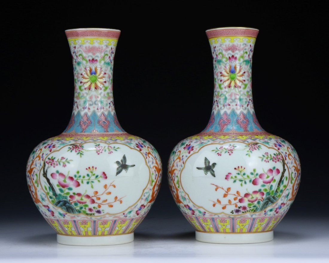 Pair Chinese Antique Famille Rose Porcelain Vases: Pair Chinese Antique Famille Rose Porcelain Vases: of globular form rising to a cylindrical neck and slightly flared mouth, the exterior finely painted with floral vines and two panels of birds on blo