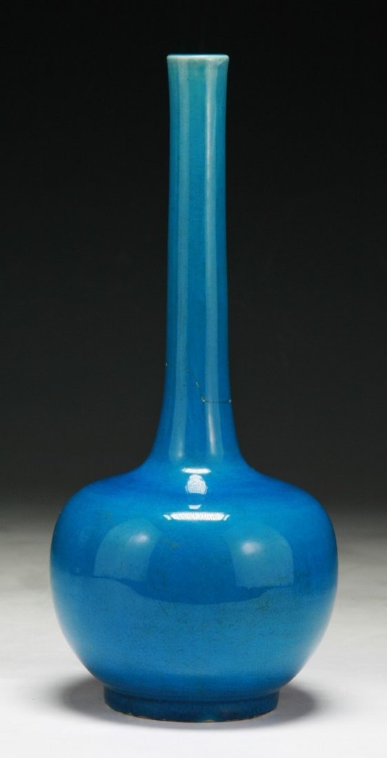 A Chinese Antique Blue Glazed Porcelain Vase: A Chinese Antique Blue Glazed Porcelain Vase: of globular form rising to a cylindrical neck; Size: H: 9-1/2"