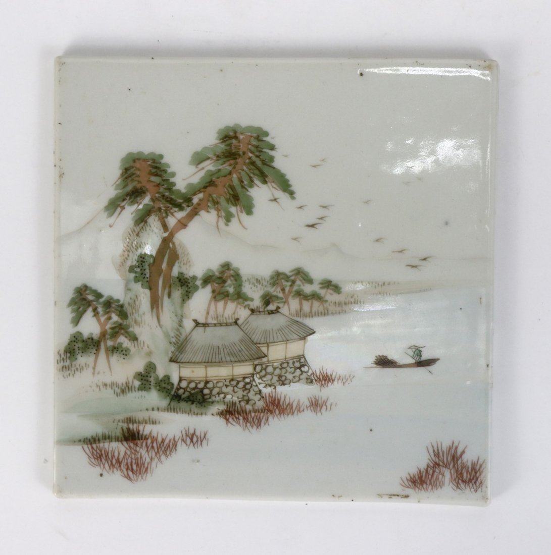 A Chinese Antique Famille Rose Porcelain Plaque: A Chinese Antique Famille Rose Porcelain Plaque: finely painted with a landscape water scene including a figure in a boat; Size: H: 6"; W: 6"