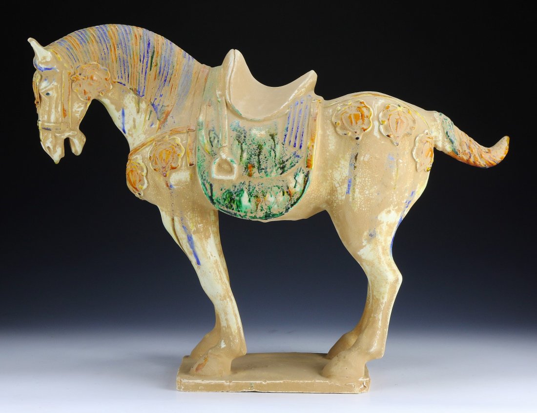 A STRAW AND AMBER-GLAZED POTTERY FIGURE OF A HORSE (1 of 4)