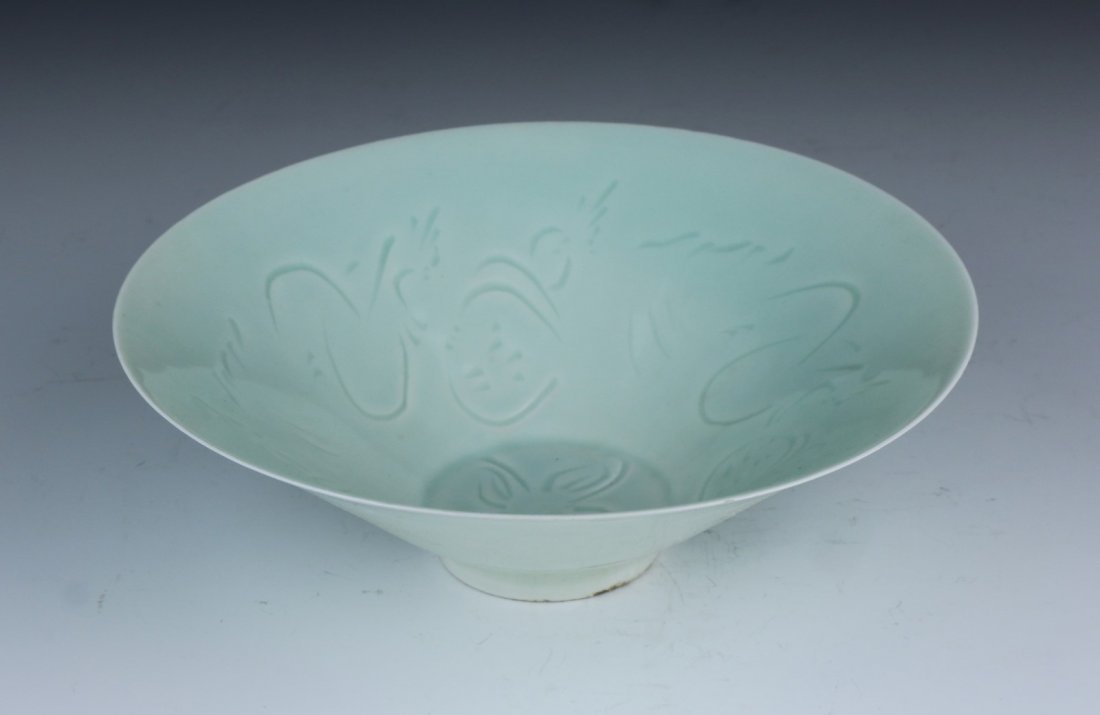A Rare Moulded QINGBAI Glazed Bowl (1 of 3)