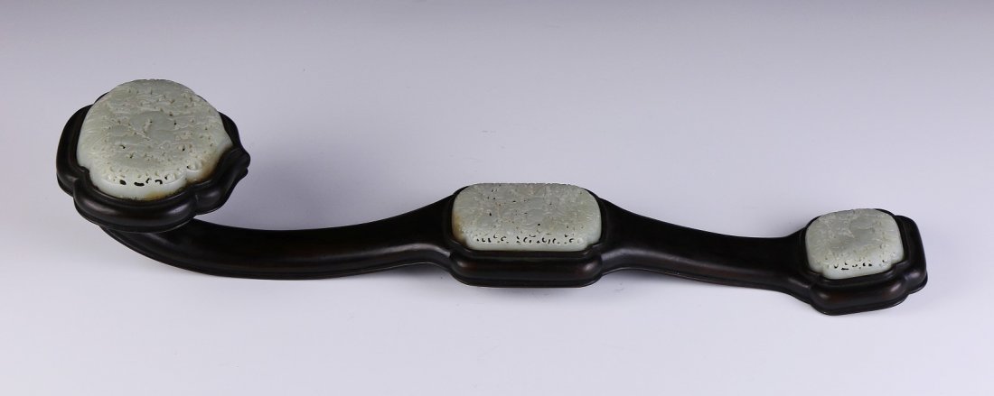 A Chinese Antique Jade-Inset Wood Ruyi Scepter (1 of 5)