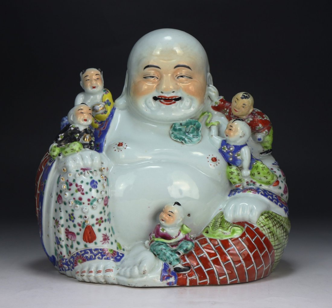 A Chinese Antique Famille Rose Porcelain Buddha: 民國茂記生造粉彩彌勒佛像 finely painted as Buddha in a seated position surrounded by five small children, signed on the base, of