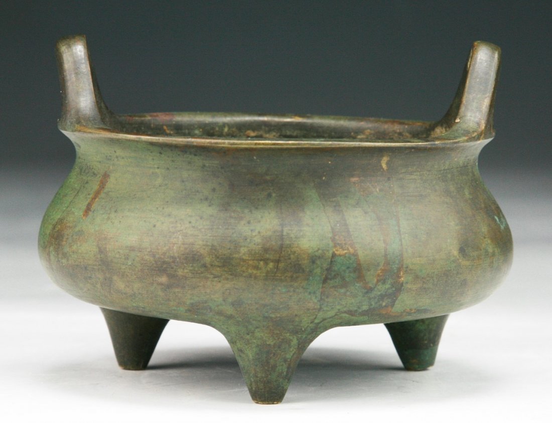 A Chinese Antique Bronze Censer: A Chinese Antique Bronze Censer: with ''XUANDE'' mark on the base and of Qing Dynasty; Size: H: 3-1/4"