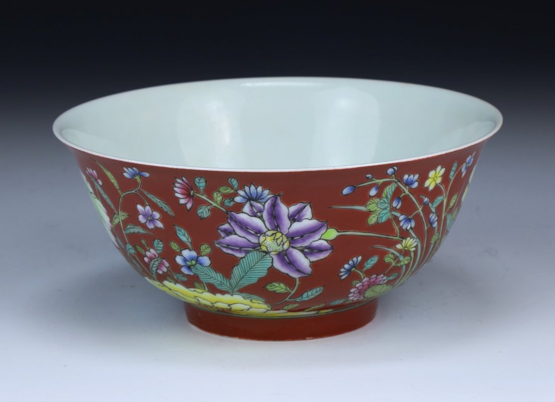 A Fine Chinese Antique Falangcai Porcelain Bowl: A Fine Chinese Antique FALANGCAI Porcelain Bowl: the large bowl finely potted with gently rounded sides rising to an everted mouth rim, exquisitely enameled around the sides in shades of pink, yellow