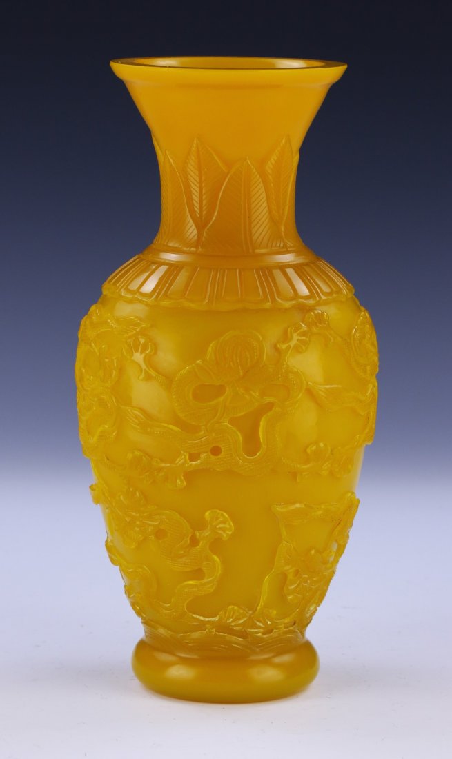 A Chinese Antique Yellow Peking Glass Vase: A Chinese Antique Yellow Peking Glass Vase: Of Shouldered Form, Featuring A Cylindrical Neck That Ends in An Outwardly Flared Rim, With Sprawling Dragon Figures Present Throughout The Body; Size: H: 1