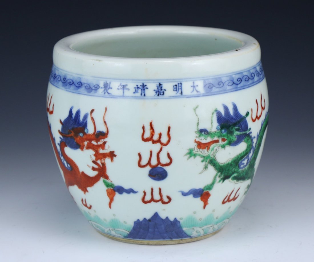 A Chinese Antique Famille Verte Porcelain Jar: 明嘉靖青花五彩龍紋小缸 A Chinese Antique Famille Verte Porcelain Jar: Of Globular Form, The Body Finely Painted With Two Sprawling Red