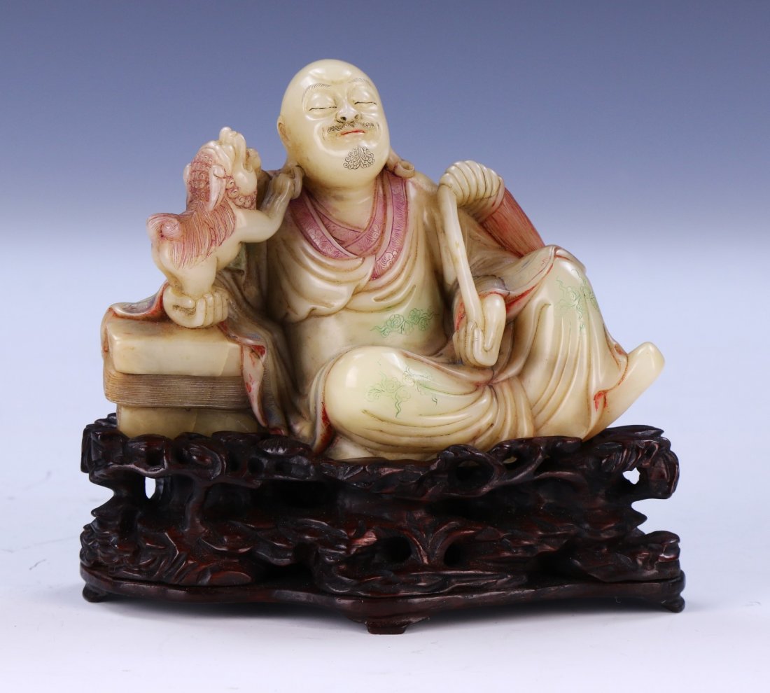 A Chinese Shoushan Soapstone Laughing Lion Lohan: 清壽山石雕笑獅羅漢像 A Chinese Shoushan Soapstone Laughing Lion Lohan: The Luminous Stone Is Of Warm, Creamy Honey Color, Shown Resting And 