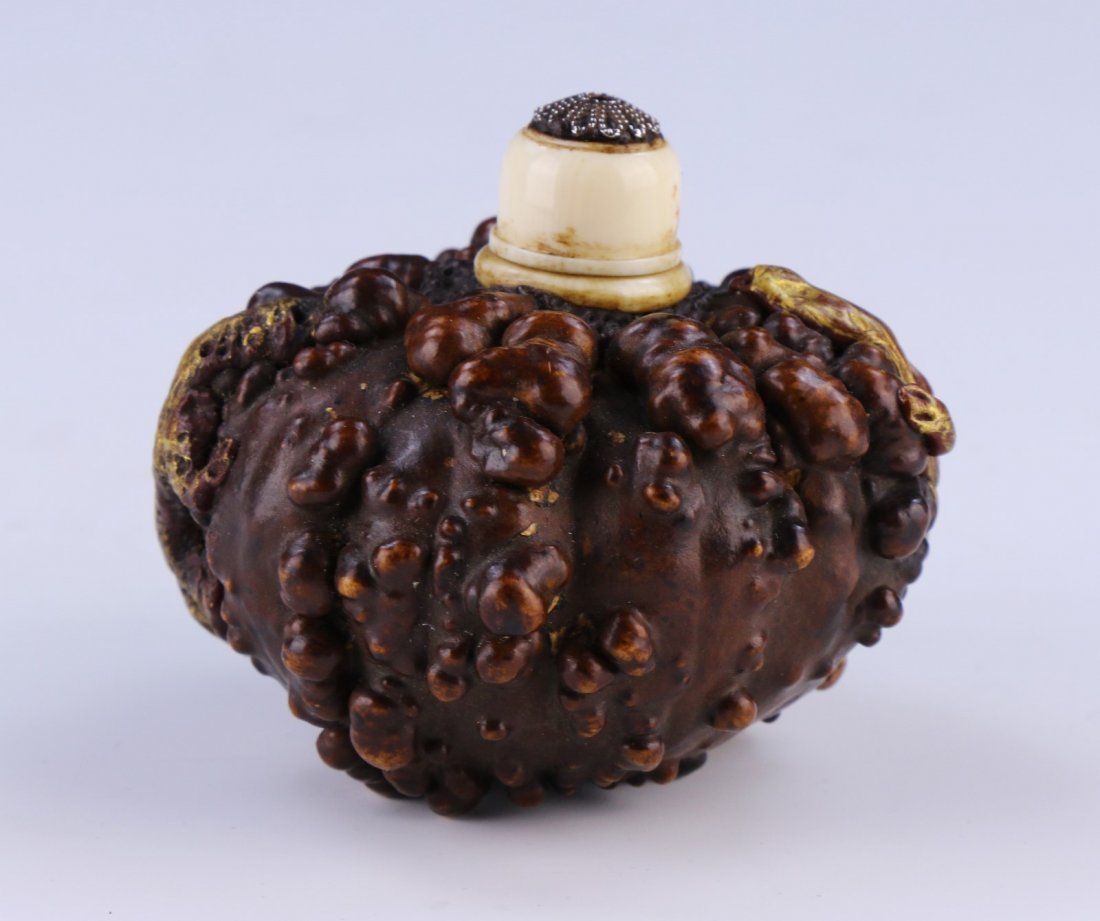 A Chinese Antique Gourd Carved Snuff Bottle: 匏器鎏金雕螭龍鼻煙壺A Chinese Antique Gourd Carved Snuff Bottle: Finely Hollowed, Of Compressed Globular Form, With Two Gilt Finished Chi-Dr