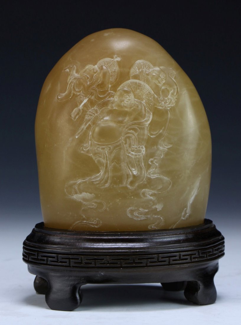 A Rare & Big Shoushan Gaoshandong Soapstone Seal: 壽山石高山凍大印章 A RARE & BIG SHOUSHAN GAOSHANDONG SOAPSTONE SEAL: of oval boulder form, carved in low relief on one side with a laughing Buddha