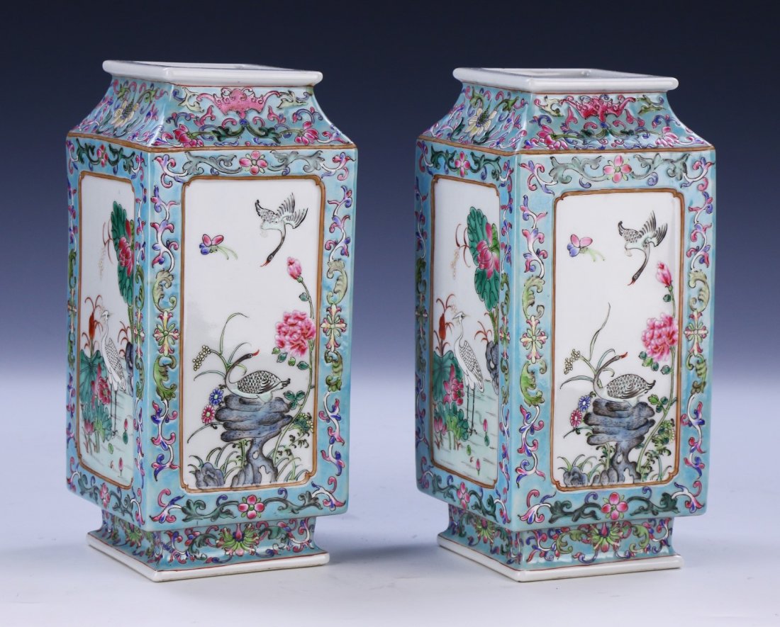 PAIR CHINESE ANTIQUE FAMILLE ROSE PORCELAIN VASES: Pair Chinese Antique Famille Rose Porcelain Vases: Of Elongated Square Form, Each Side Of The Body Finely Painted With Birds Amid Blossoming Branches, The Panels Surrounded By Foliage And Bats On A Li