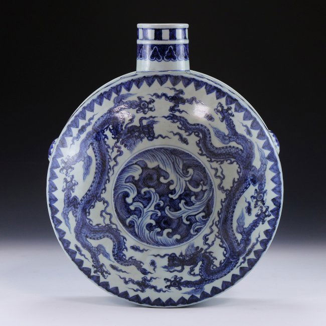 A CHINESE ANTIQUE BLUE & WHITE WINE POT: A Chinese Antique Blue & White Wine Pot: Of Flattened Round Form, Body Finely Painted in Cobalt Blue Along One Side With Two Swirling Dragons, All Between The Band Of Leaves, Six Character xuande Mark