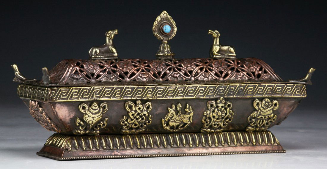 A TIBETAN BRASS RITUAL VESSEL (1 of 4)