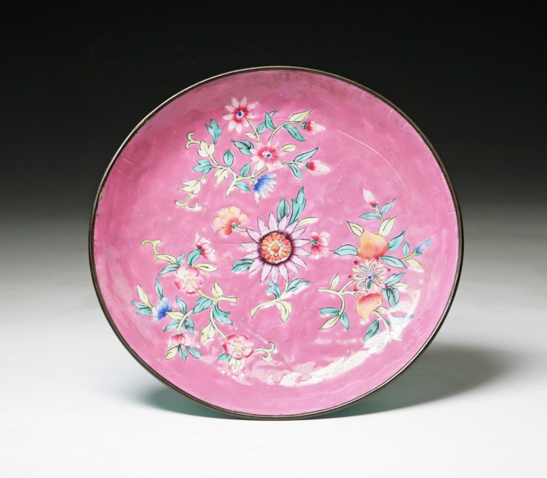 A CHINESE ANTIQUE CLOISONNE BRONZE PLATE: A Chinese Antique Cloisonne Bronze Plate: Finely Enamelled To The interior With The Blossoms Amid Leafy Stems, Reserved On A Pink Ground While The Exterior Enamelled Blue, Of Minguo Period; Size: D: 7