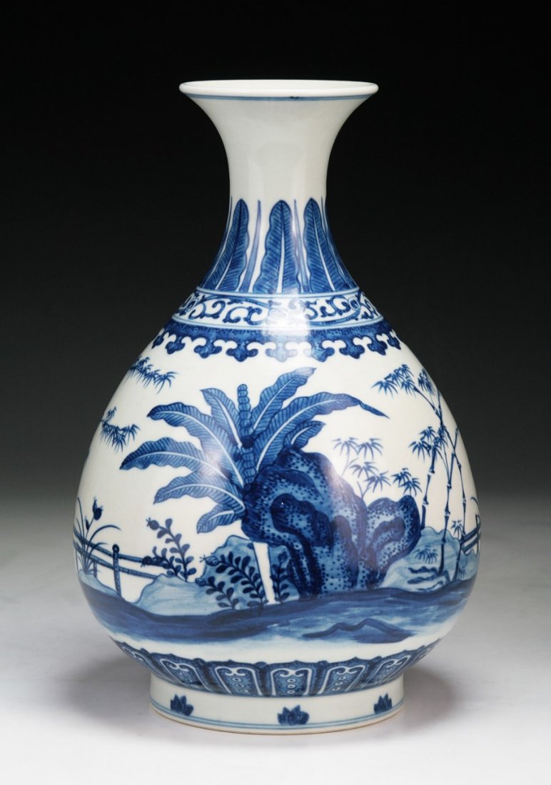 A CHINESE ANTIQUE BLUE & WHITE YUHUCHUN VASE: A Chinese Antique Blue & White Yuhuchun Vase: Finely Painted Around The Pear-Shaped Body Imitating 'Heaping And Piling' Effect With Plantain And Bamboo Growing Beside Rocks From Grassy Mounds On A Con