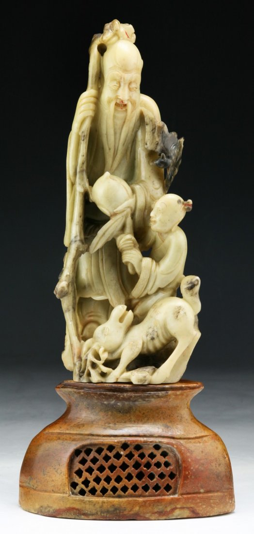 A CHINESE ANTIQUE SOAPSTONE FIGURAL GROUP (1 of 3)