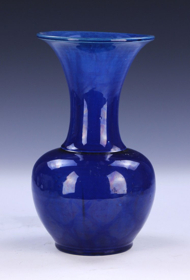 A CHINESE ANTIQUE CEREMONIAL BLUE-GLAZED PORCELAIN GU: A Chinese Antique Ceremonial Blue-Glazed Porcelain Gu Vase: Of Gu Shape, Finely Applied inside And Outside With A Rich Blue Glaze That Also Covers The Base And Thins On The Mouth Rim And Foot Rim, 19T