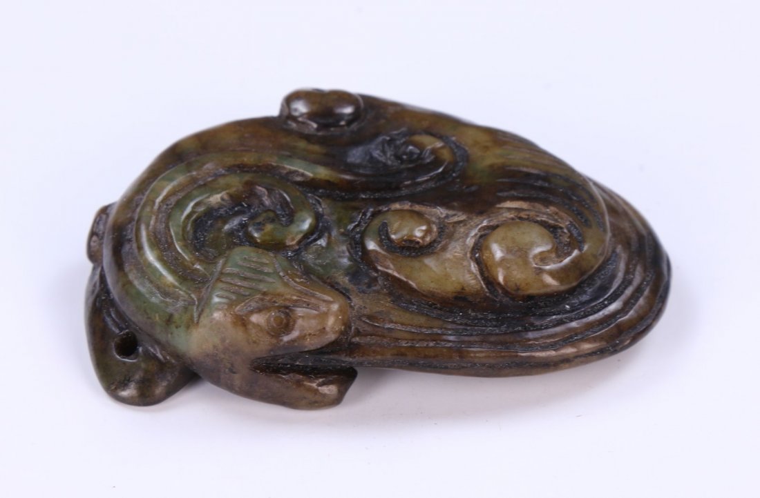 A Chinese Antique Archaic Jade Carving: A Chinese Antique Archaic Jade Carving: Of Chi Dragon Form; Size: H: 2-3/4" (6.99cm)