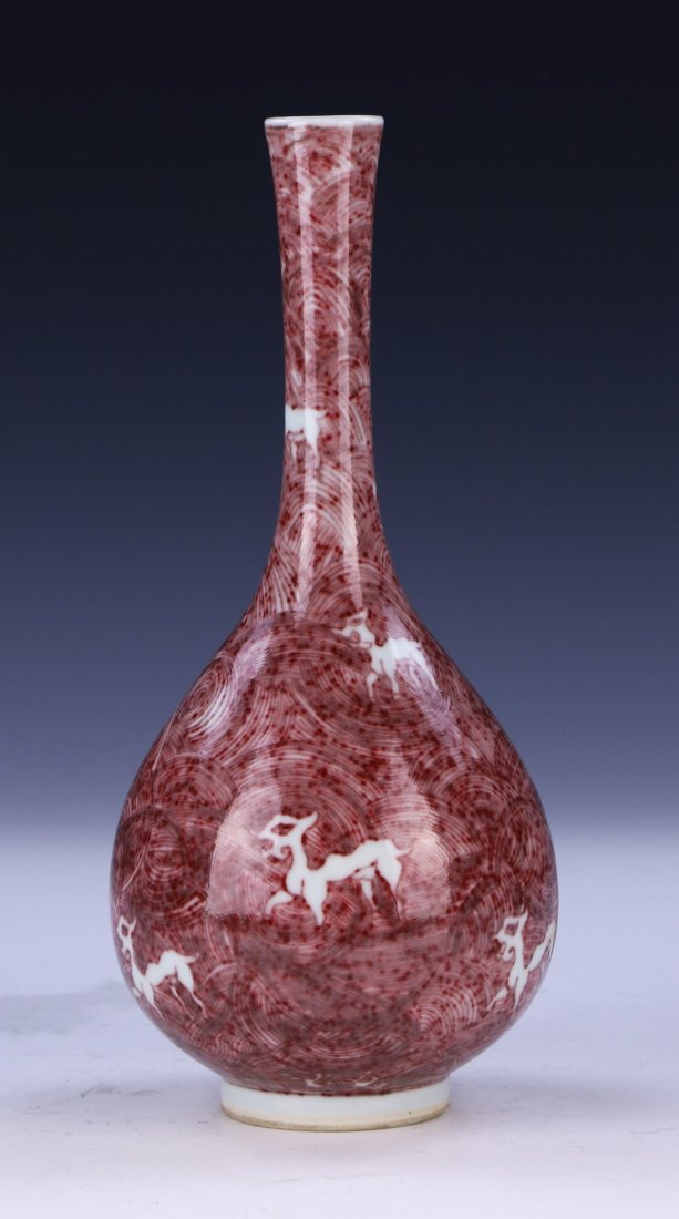 A CHINESE ANTIQUE UNDERGLAZE RED PORCELAIN VASE (1 of 4)