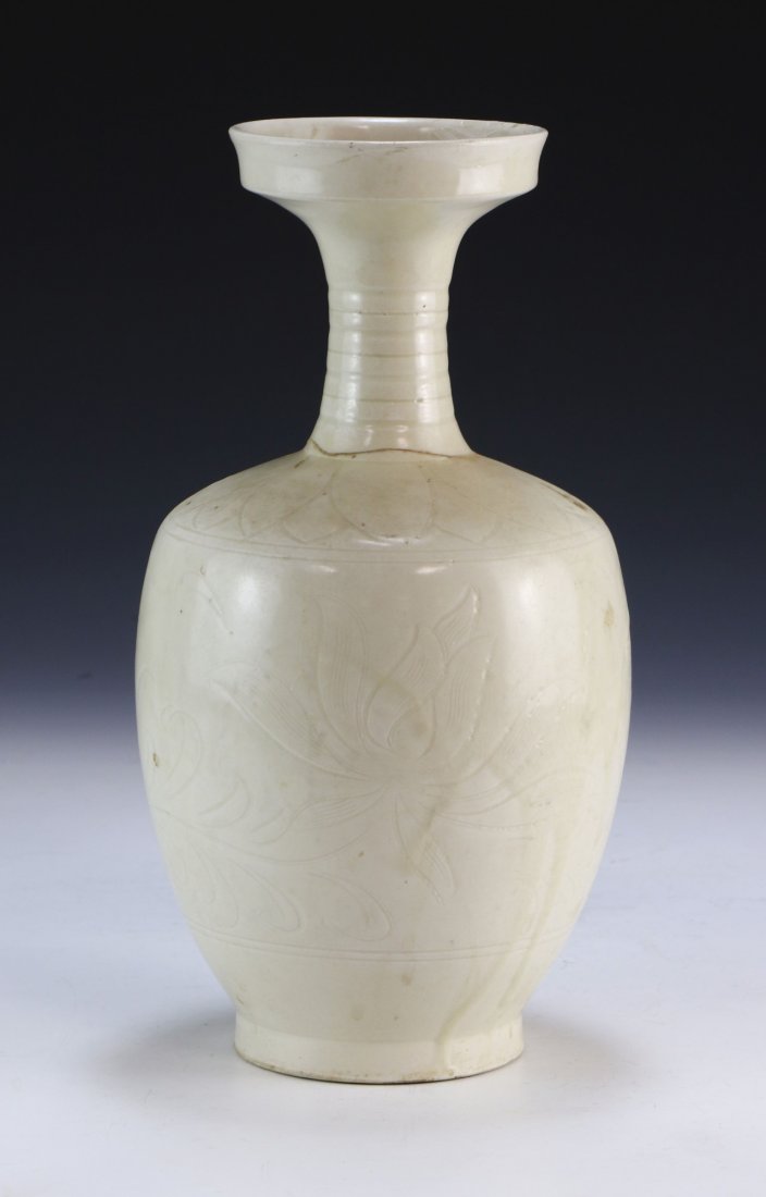 A CHINESE ANTIQUE WHITE GLAZED PORCELAIN VASE: A Chinese Antique White Glazed Porcelain Vase: Of Shouldered Form, Ridged Neck Rising To An Outwardly Flared Rim, Body Finely Painted With A Subtle Blooming Flower Design Amid A Crackle Glaze Finish;