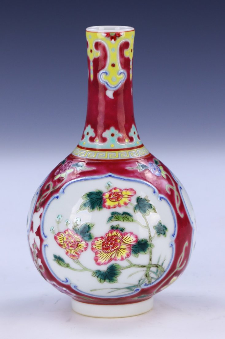 A Chinese Antique Famille Rose Porcelain Vase: A Chinese Antique Famille Rose Porcelain Vase: Of Globular Form, Slim And Cylindrical Neck Extending To A Slightly Flared Rim, Body Finely Painted With Three Separate Blooming Flower Scenes; Size: H: