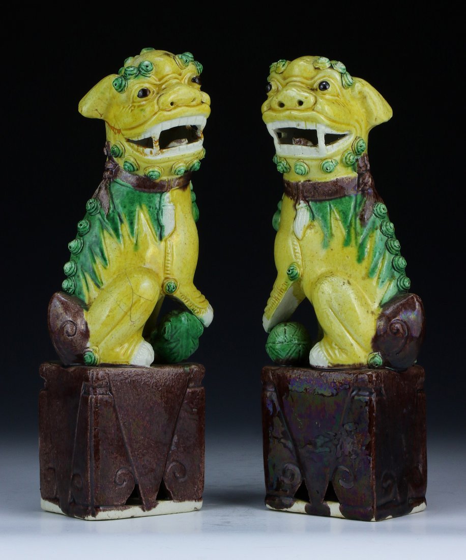 PAIR CHINESE ANTIQUE YELLOW GLAZED PORCELAIN LIONS: Pair Chinese Antique Yellow Glazed Porcelain Lions; Size: H: 9-1/2" (24.13cm) Each