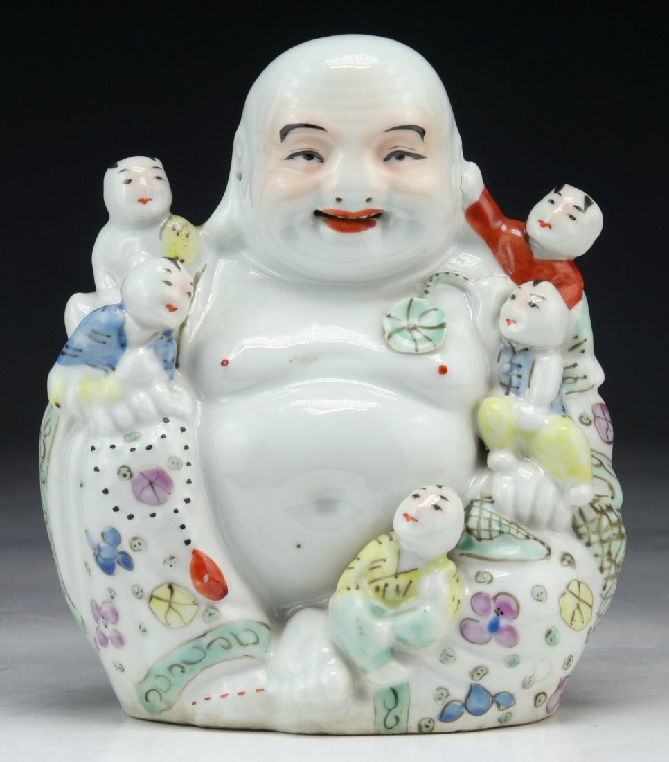 A CHINESE ANTIQUE FAMILLE ROSE PORCELAIN BUDDHA: A Chinese Antique Famille Rose Porcelain Buddha; Size: H: 6" (15.24cm)