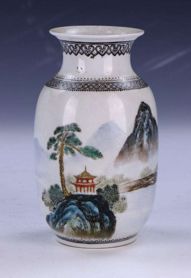 A CHINESE ANTIQUE FAMILLE ROSE PORCELAIN VASE: A Chinese Antique Famille Rose Porcelain Vase: Finely Painted Around The Round Body With The Continuous Scene Of Landscape, Four Character Qianlong Mark On The Base in Iron Red; Size: H: 6-1/2" (16.51