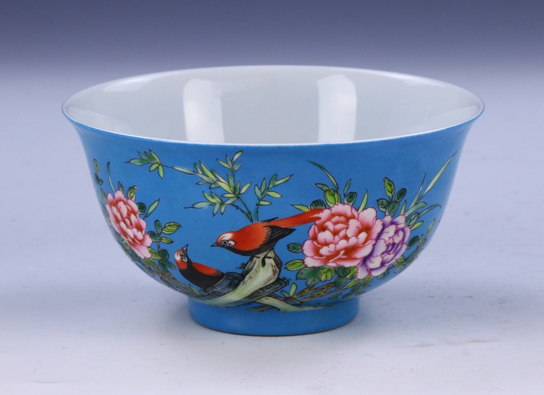 A CHINESE ANTIQUE FAMILLE ROSE BLUE GLAZED PORCELAIN: A Chinese Antique Famille Rose Blue Glazed Porcelain Bowl: Of Rising Sides, Finely Painted On The Exterior With Birds Perched Amid Branches And Blooming Flowers Of Mixed Tones, Four Character Mark On