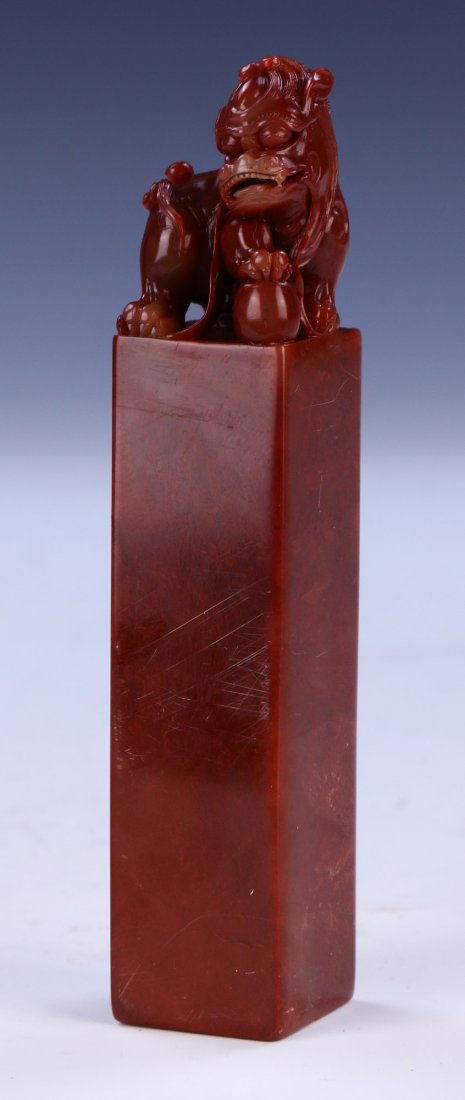 A CHINESE ANTIQUE CINNABAR STONE SEAL (1 of 5)