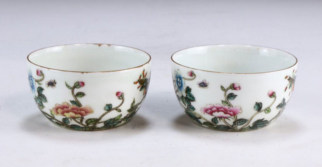 PAIR CHINESE ANTIQUE GILT FAMILLE ROSE PORCELAIN CUPS: Pair Chinese Antique Gilt Famille Rose Porcelain Cups: Of Rounded Sides, Finely Painted Along The Exteriors With Birds At Rest On Branches Amid Blooming Flowers Of Red And Blue Tones, Both Signed With