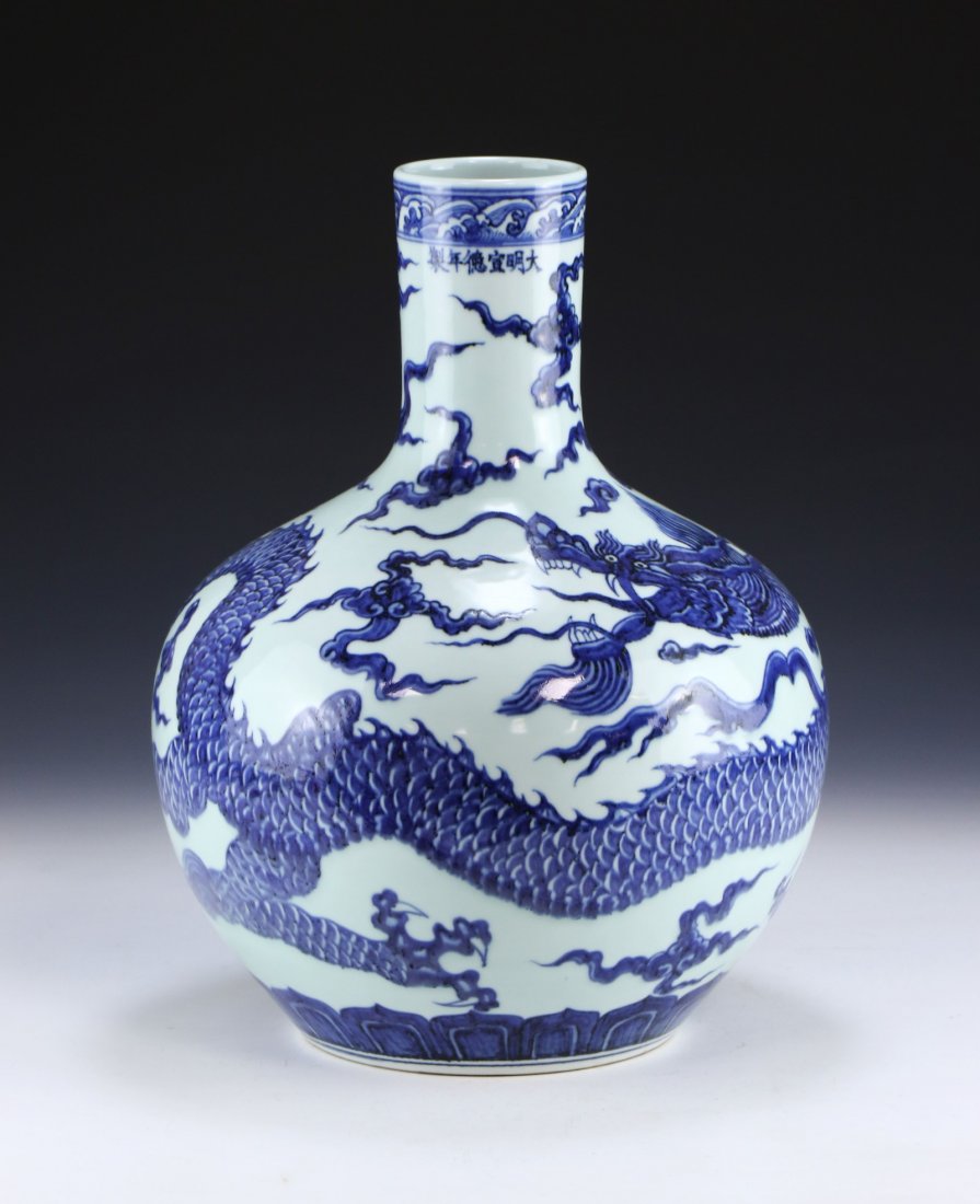 A BIG CHINESE ANTIQUE BLUE & WHITE GLAZED PORCELAIN: A Big Chinese Antique Blue & White Glazed Porcelain Vase: Of Globular Form, Body Finely Painted With A Swirling Dragon Amid Clouds Chasing A Flaming Pearl; Size: H: 14" (35.56cm)